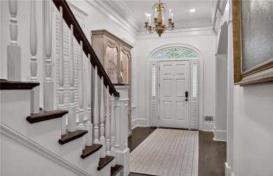 Enjoy the timeless charm of Charleston just minutes from Atlanta on Atlanta Athletic Club in Georgia - for sale on GolfHomes.com, golf home, golf lot