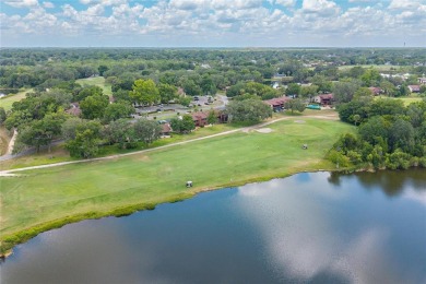 Wake up to stunning views of Jade Lake, the 11th Green of the on Country Club At Silver Springs Shores in Florida - for sale on GolfHomes.com, golf home, golf lot
