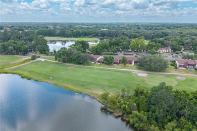 Wake up to stunning views of Jade Lake, the 11th Green of the on Country Club At Silver Springs Shores in Florida - for sale on GolfHomes.com, golf home, golf lot