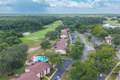 Wake up to stunning views of Jade Lake, the 11th Green of the on Country Club At Silver Springs Shores in Florida - for sale on GolfHomes.com, golf home, golf lot