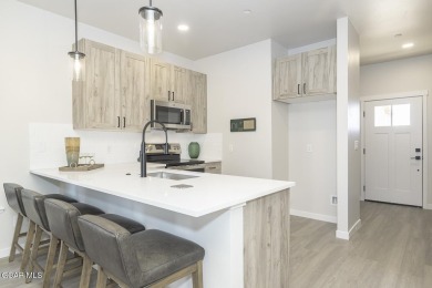 This great 2-bedroom 1.5 bath townhome is everything you need in on Headwaters Golf Course At Granby Ranch in Colorado - for sale on GolfHomes.com, golf home, golf lot