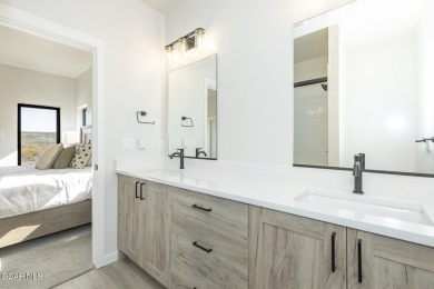 This great 2-bedroom 1.5 bath townhome is everything you need in on Headwaters Golf Course At Granby Ranch in Colorado - for sale on GolfHomes.com, golf home, golf lot