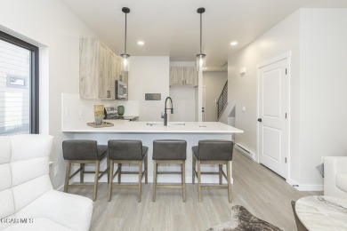 This great 2-bedroom 1.5 bath townhome is everything you need in on Headwaters Golf Course At Granby Ranch in Colorado - for sale on GolfHomes.com, golf home, golf lot
