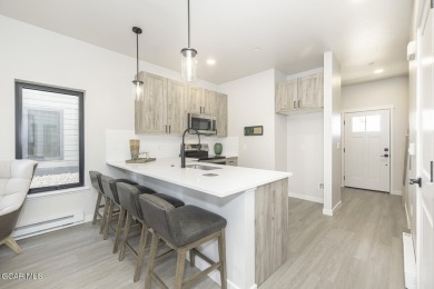 This great 2-bedroom 1.5 bath townhome is everything you need in on Headwaters Golf Course At Granby Ranch in Colorado - for sale on GolfHomes.com, golf home, golf lot