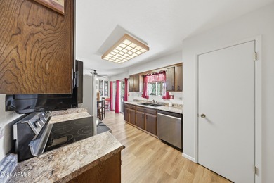 Adorable Apache Model Home In The Heart Of Phase 2 Of Sun City on Sun City Lakes West and East in Arizona - for sale on GolfHomes.com, golf home, golf lot