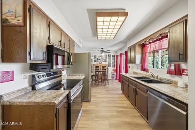 Adorable Apache Model Home In The Heart Of Phase 2 Of Sun City on Sun City Lakes West and East in Arizona - for sale on GolfHomes.com, golf home, golf lot