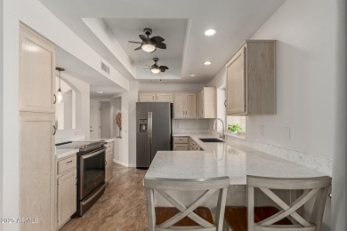 Discover this inviting ranch-style home perfectly placed on a on Trail Ridge Golf Course in Arizona - for sale on GolfHomes.com, golf home, golf lot