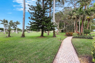 Discover your perfect Naples retreat in this TOP-FLOOR 2-bedroom on Royal Palm Golf Club in Florida - for sale on GolfHomes.com, golf home, golf lot