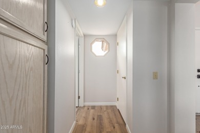 Discover this inviting ranch-style home perfectly placed on a on Trail Ridge Golf Course in Arizona - for sale on GolfHomes.com, golf home, golf lot