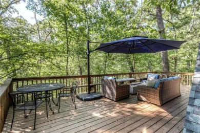 Beautiful chalet surrounded by a gorgeous wooded lot for amazing on Innsbrook Resort Golf Course in Missouri - for sale on GolfHomes.com, golf home, golf lot