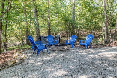 Beautiful chalet surrounded by a gorgeous wooded lot for amazing on Innsbrook Resort Golf Course in Missouri - for sale on GolfHomes.com, golf home, golf lot