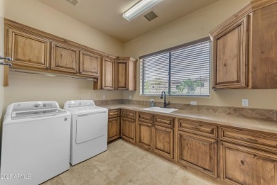 Located in the exclusive gated community of Rock Canyon II at on Las Sendas Golf Club in Arizona - for sale on GolfHomes.com, golf home, golf lot