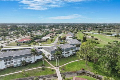 Discover your perfect Naples retreat in this TOP-FLOOR 2-bedroom on Royal Palm Golf Club in Florida - for sale on GolfHomes.com, golf home, golf lot