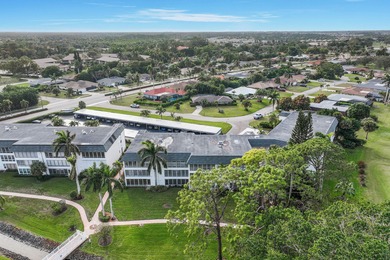 Discover your perfect Naples retreat in this TOP-FLOOR 2-bedroom on Royal Palm Golf Club in Florida - for sale on GolfHomes.com, golf home, golf lot