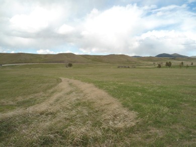 CLOSE TO TOWN AND OVERLOOKING JUDITH SHADOWS GOLF COURSEE OUT on Judith Shadows Golf Course in Montana - for sale on GolfHomes.com, golf home, golf lot