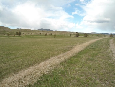 CLOSE TO TOWN AND OVERLOOKING JUDITH SHADOWS GOLF COURSEE OUT on Judith Shadows Golf Course in Montana - for sale on GolfHomes.com, golf home, golf lot