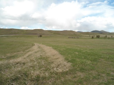 CLOSE TO TOWN AND OVERLOOKING JUDITH SHADOWS GOLF COURSEE OUT on Judith Shadows Golf Course in Montana - for sale on GolfHomes.com, golf home, golf lot