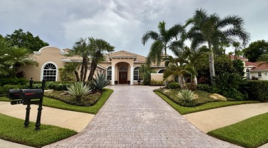 Truly special 4 bedroom, 4.5 bath + den home in the exclusive on BallenIsles Golf and Country Club in Florida - for sale on GolfHomes.com, golf home, golf lot