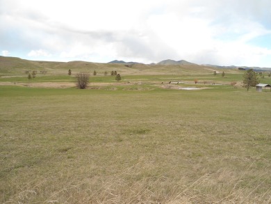 CLOSE TO TOWN AND OVERLOOKING JUDITH SHADOWS GOLF COURSEE OUT on Judith Shadows Golf Course in Montana - for sale on GolfHomes.com, golf home, golf lot