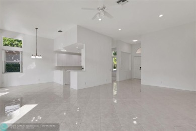 Highly sought-after *The Pointe* at Weston Hills! Located in a on Weston Hills Country Club in Florida - for sale on GolfHomes.com, golf home, golf lot