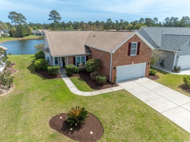 Welcome to 41 Bear Creek Loop! A beautiful lakefront retreat in on TPC of Myrtle Beach in South Carolina - for sale on GolfHomes.com, golf home, golf lot