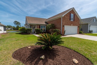 Welcome to 41 Bear Creek Loop! A beautiful lakefront retreat in on TPC of Myrtle Beach in South Carolina - for sale on GolfHomes.com, golf home, golf lot