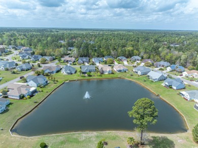 Welcome to 41 Bear Creek Loop! A beautiful lakefront retreat in on TPC of Myrtle Beach in South Carolina - for sale on GolfHomes.com, golf home, golf lot