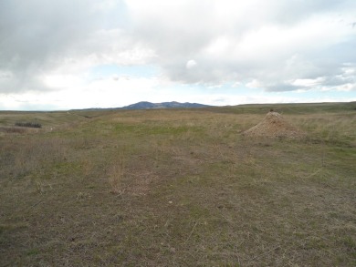 CLOSE TO TOWN AND OVERLOOKING JUDITH SHADOWS GOLF COURSEE PICK on Judith Shadows Golf Course in Montana - for sale on GolfHomes.com, golf home, golf lot