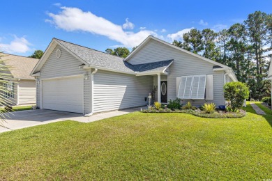 Stunningly kept 3 bedroom and 2 bathroom home in the beautiful on Heron Point Golf Club in South Carolina - for sale on GolfHomes.com, golf home, golf lot