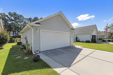 Stunningly kept 3 bedroom and 2 bathroom home in the beautiful on Heron Point Golf Club in South Carolina - for sale on GolfHomes.com, golf home, golf lot