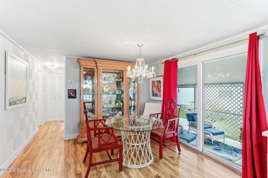 Come see this magnificently updated 2BR/2BA home in the heart of on Barefoot Bay Golf Course in Florida - for sale on GolfHomes.com, golf home, golf lot