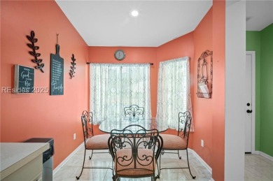 Light-Filled One-Level End Unit in Sun City! Nestled in a on Okatie Creek Golf Club in South Carolina - for sale on GolfHomes.com, golf home, golf lot