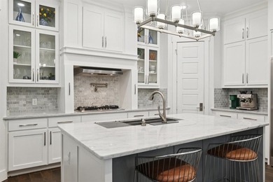 Welcome to this stunning custom Greenbriar home ideally situated on Heath Golf and Yacht Club in Texas - for sale on GolfHomes.com, golf home, golf lot