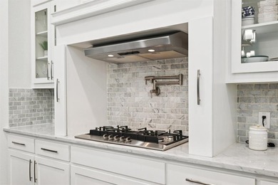 Welcome to this stunning custom Greenbriar home ideally situated on Heath Golf and Yacht Club in Texas - for sale on GolfHomes.com, golf home, golf lot