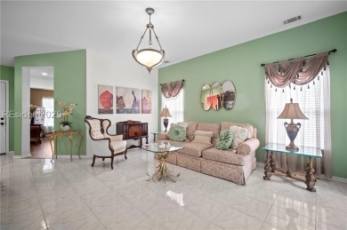 Light-Filled One-Level End Unit in Sun City! Nestled in a on Okatie Creek Golf Club in South Carolina - for sale on GolfHomes.com, golf home, golf lot