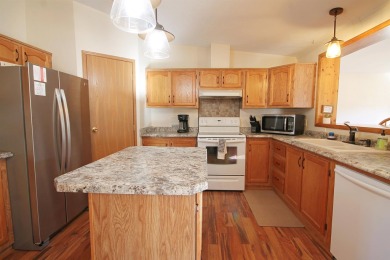 Well Maintained and updated 3 bedroom 2 bath home with an open on Boulder Canyon Country Club in South Dakota - for sale on GolfHomes.com, golf home, golf lot