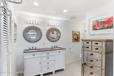 Come see this magnificently updated 2BR/2BA home in the heart of on Barefoot Bay Golf Course in Florida - for sale on GolfHomes.com, golf home, golf lot