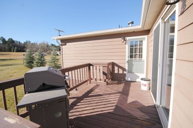 Well Maintained and updated 3 bedroom 2 bath home with an open on Boulder Canyon Country Club in South Dakota - for sale on GolfHomes.com, golf home, golf lot