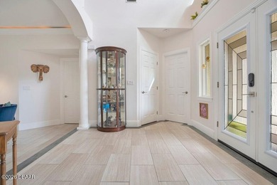 Drenched in natural light and beautifully upgraded throughout on  in Florida - for sale on GolfHomes.com, golf home, golf lot