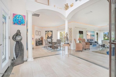 Drenched in natural light and beautifully upgraded throughout on  in Florida - for sale on GolfHomes.com, golf home, golf lot