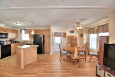 BEAUTIFUL FLORIDA HOME located in this DESIRABLE 55+GATED on Southern Dunes Golf and Country Club in Florida - for sale on GolfHomes.com, golf home, golf lot