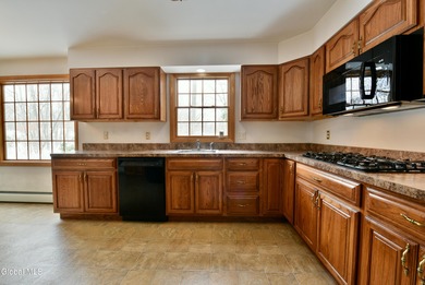 Great Clifton Knolls home ready for its new owners! Lovingly on Clifton Knolls Executive Golf Course in New York - for sale on GolfHomes.com, golf home, golf lot