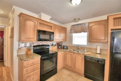 BEAUTIFUL FLORIDA HOME located in this DESIRABLE 55+GATED on Southern Dunes Golf and Country Club in Florida - for sale on GolfHomes.com, golf home, golf lot