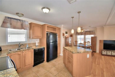 BEAUTIFUL FLORIDA HOME located in this DESIRABLE 55+GATED on Southern Dunes Golf and Country Club in Florida - for sale on GolfHomes.com, golf home, golf lot