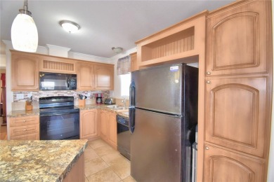 BEAUTIFUL FLORIDA HOME located in this DESIRABLE 55+GATED on Southern Dunes Golf and Country Club in Florida - for sale on GolfHomes.com, golf home, golf lot