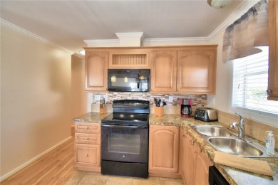 BEAUTIFUL FLORIDA HOME located in this DESIRABLE 55+GATED on Southern Dunes Golf and Country Club in Florida - for sale on GolfHomes.com, golf home, golf lot