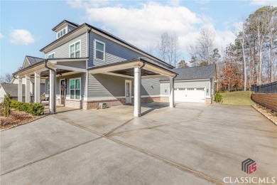 Experience Luxury Living in This Beautiful Craftsman Home! on Traditions of Braselton Golf Club in Georgia - for sale on GolfHomes.com, golf home, golf lot