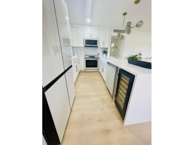 This is a must see new and custom designed CORNER VILLA! on Kings Point Golf -Flanders Way in Florida - for sale on GolfHomes.com, golf home, golf lot
