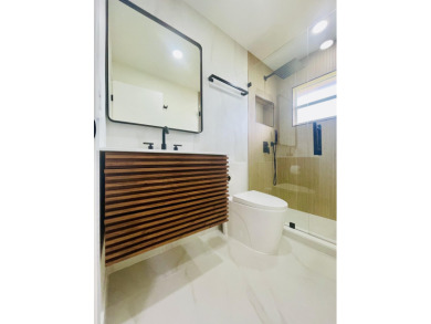 This is a must see new and custom designed CORNER VILLA! on Kings Point Golf -Flanders Way in Florida - for sale on GolfHomes.com, golf home, golf lot