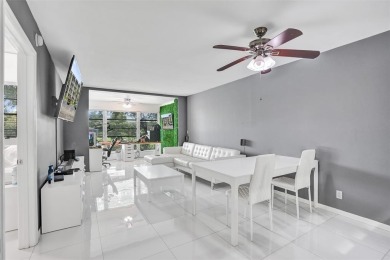 Beautifully updated 2nd-floor condo offering 1 bedroom, 1.5 on Pine Island Ridge Country Club in Florida - for sale on GolfHomes.com, golf home, golf lot